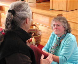 a pair of people in an empathic connection, showing deep presence and listening